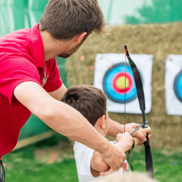 Child practicing archery