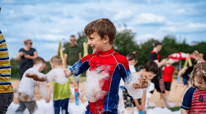 Child playing in Foam